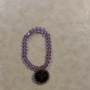 Purple Beaded Bracelet with Pendant